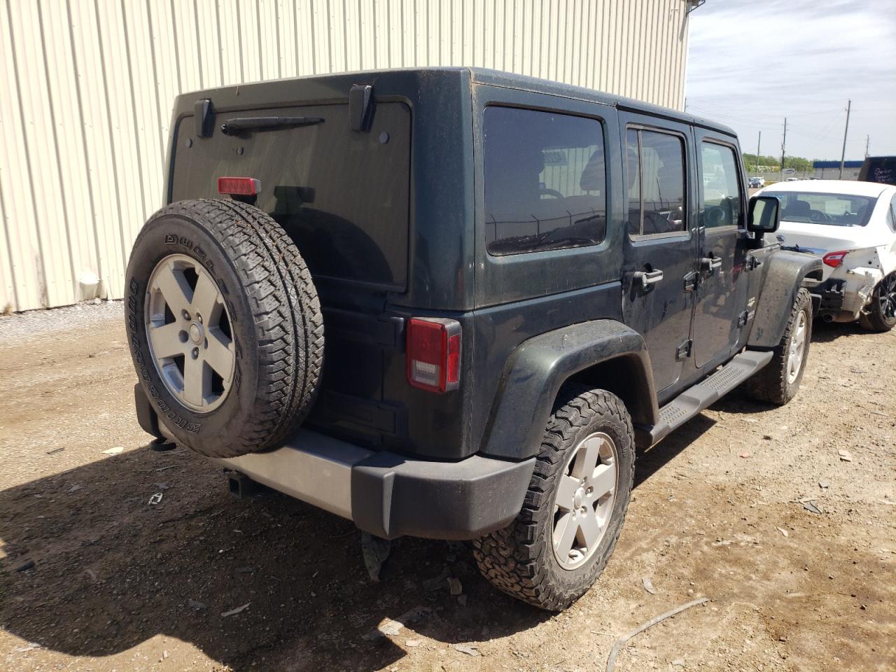 Photo 4 from auction – 2011 JEEP WRANGLER U with VIN 1J4HA5H14BL579225