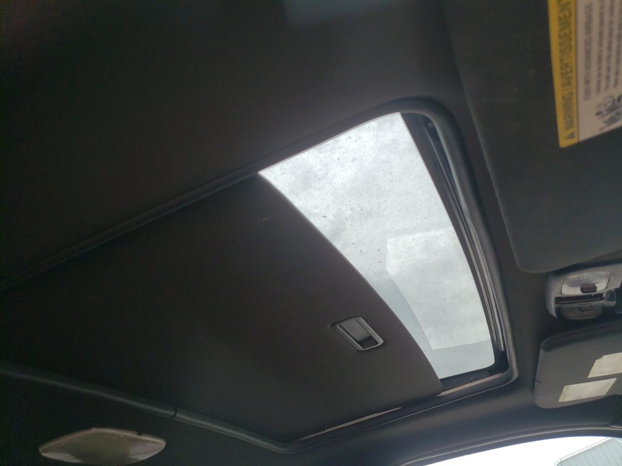 Photo 9 from auction – 2012 FORD ESCAPE LIM with VIN 1FMCU0E72CKC18128