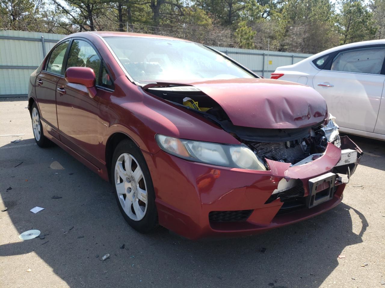 HONDA CIVIC LX 2011 with VIN 2HGFA1F57BH507428 - Photo from auction
