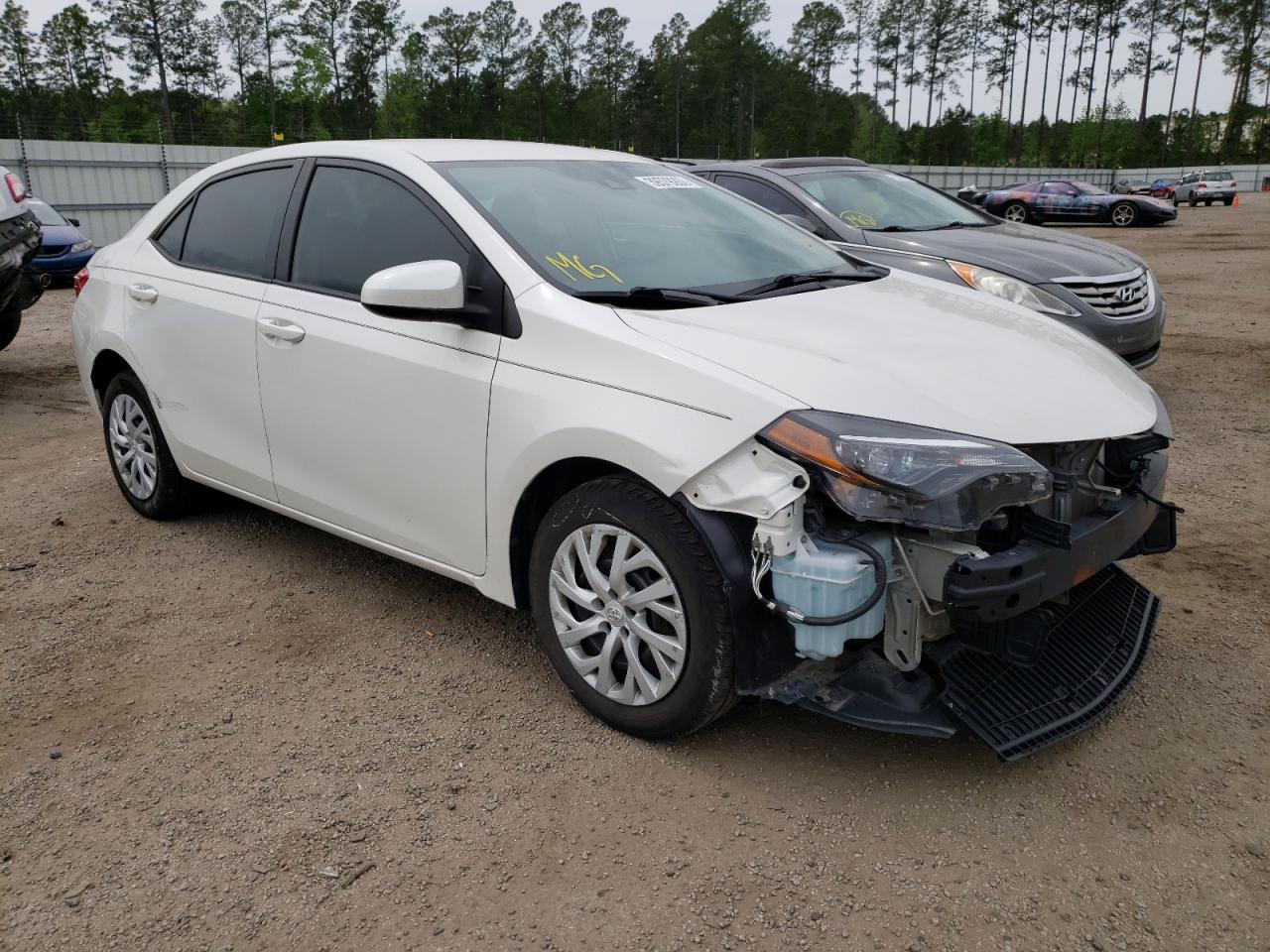 TOYOTA COROLLA L 2019 with VIN 5YFBURHE3KP878824 - Photo from auction