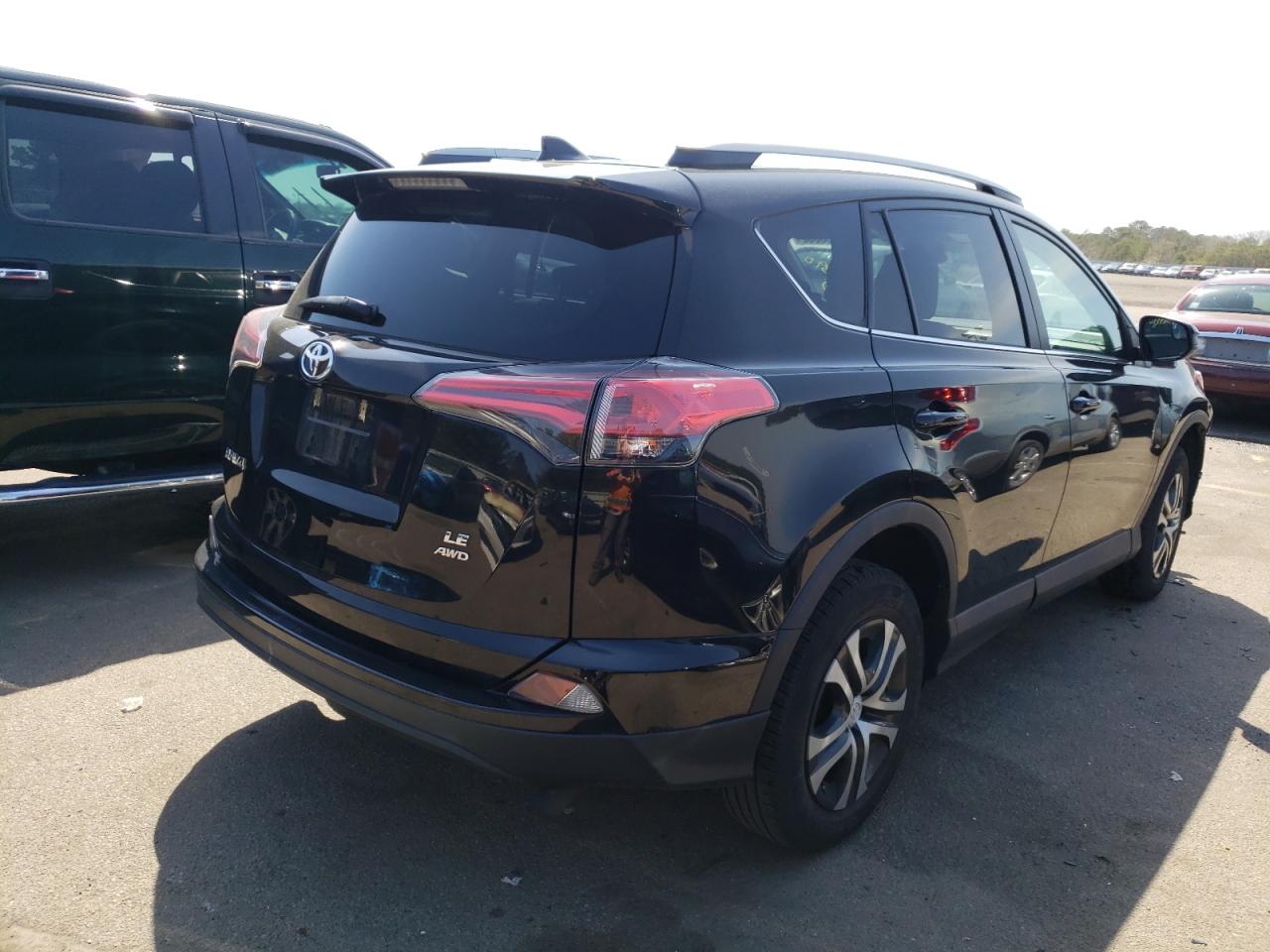 Photo 4 from auction – 2018 TOYOTA RAV4 LE with VIN 2T3BFREV3JW731390