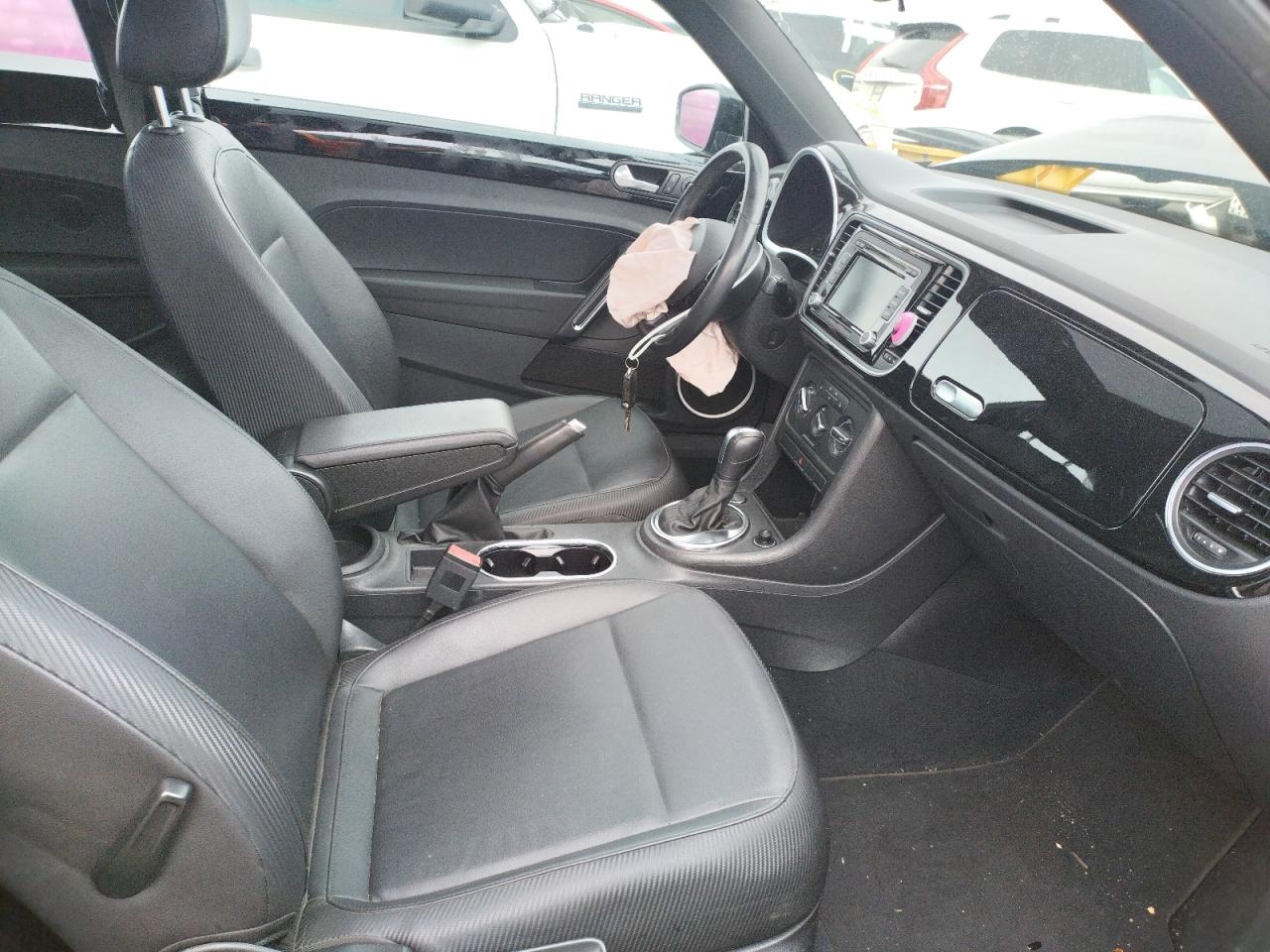 Photo 5 from auction – 2012 VOLKSWAGEN BEETLE with VIN 3VWJP7AT0CM646039