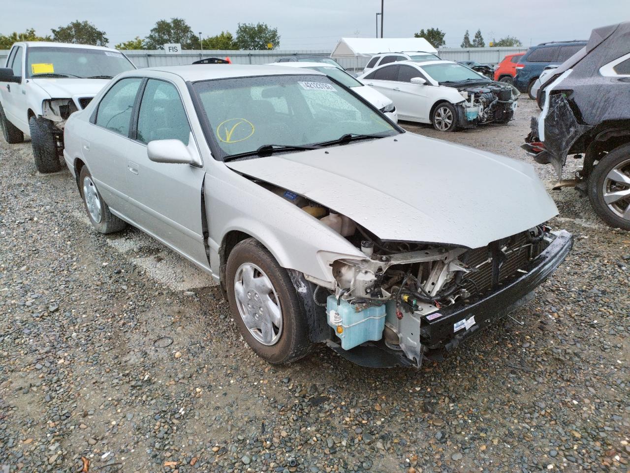 TOYOTA CAMRY CE 2000 with VIN JT2BG22K4Y0460572 - Photo from auction