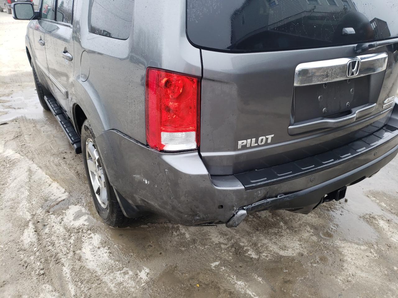 Photo 9 from auction – 2011 HONDA PILOT TOUR with VIN 5FNYF4H91BB057162
