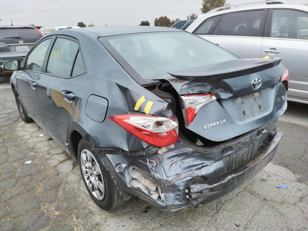 Photo 3 from auction – 2014 TOYOTA COROLLA L with VIN 5YFBURHE4EP099338