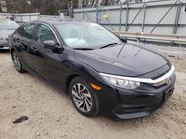 HONDA CIVIC EX 2018 with VIN 19XFC2F70JE026897 - Photo from auction