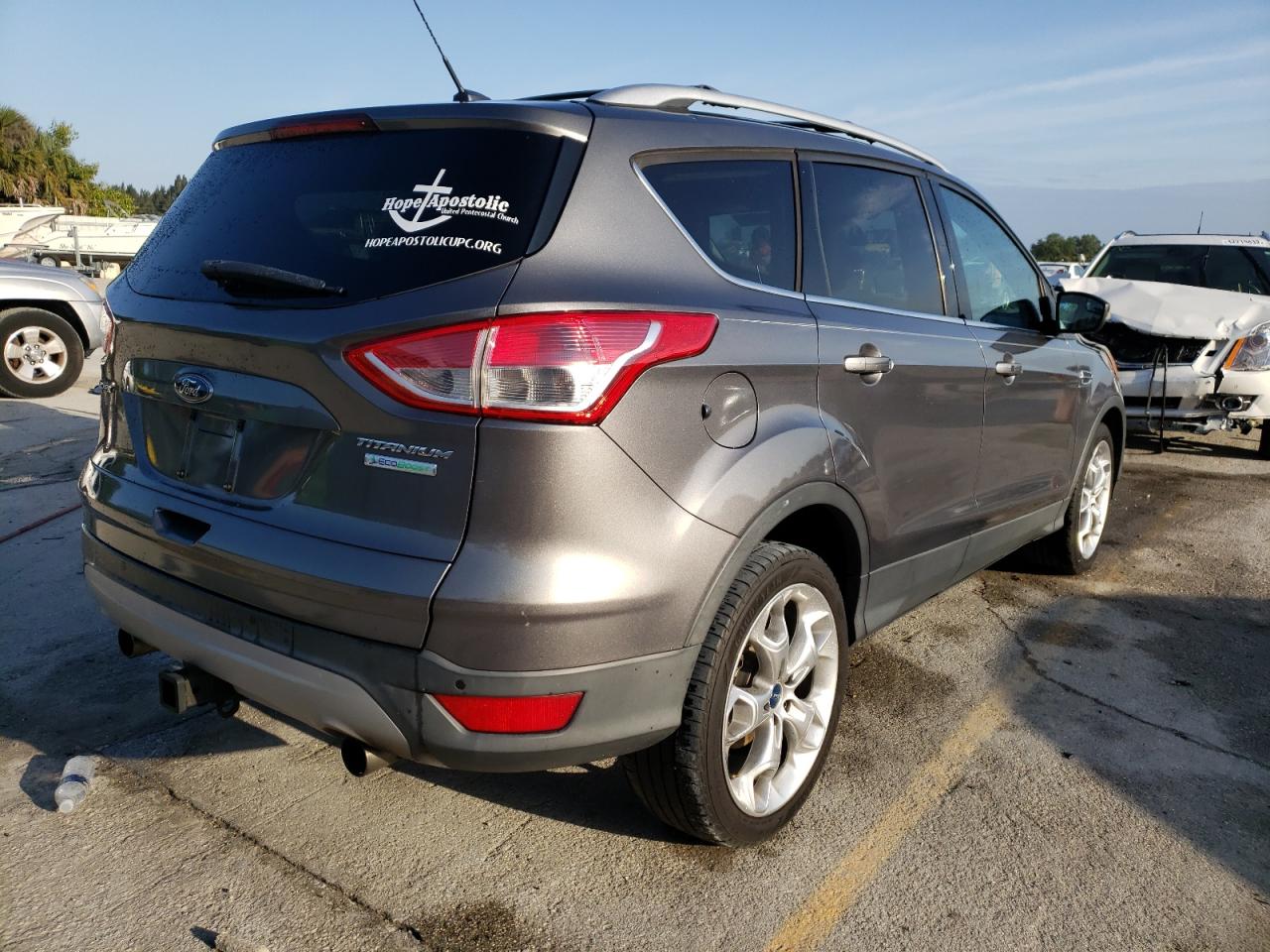 Photo 4 from auction – 2013 FORD ESCAPE TIT with VIN 1FMCU0J99DUB06259