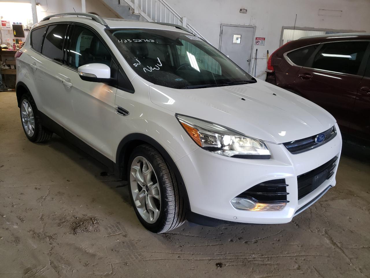 FORD ESCAPE TIT 2015 with VIN 1FMCU9J99FUB94253 - Photo from auction