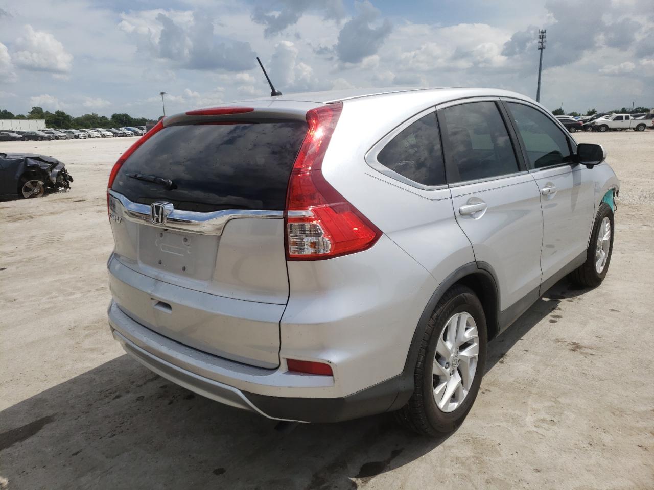 Photo 4 from auction – 2015 HONDA CR-V EX with VIN 2HKRM3H57FH507051