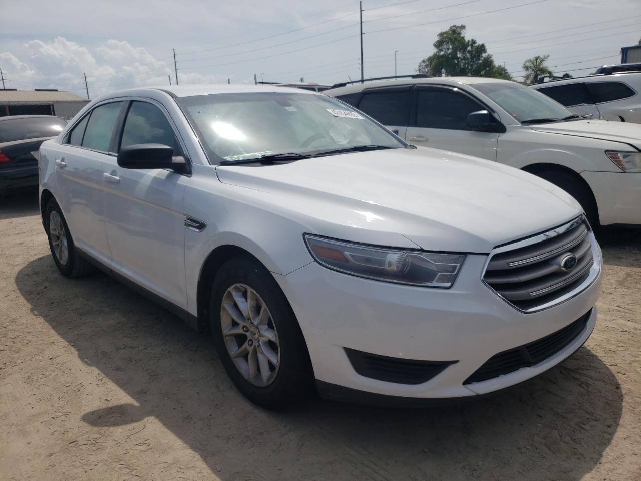 FORD TAURUS SE 2014 with VIN 1FAHP2D87EG115810 - Photo from auction