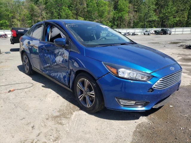 FORD FOCUS SE 2018 with VIN 1FADP3FE3JL312952 - Photo from auction