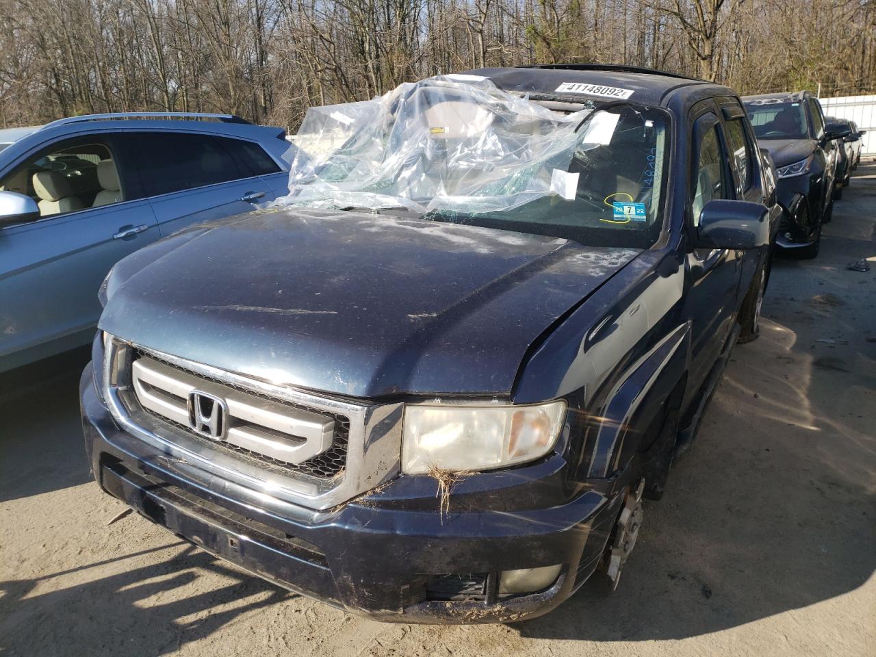 Photo 2 from auction – 2009 HONDA RIDGELINE with VIN 5FPYK16449B103845