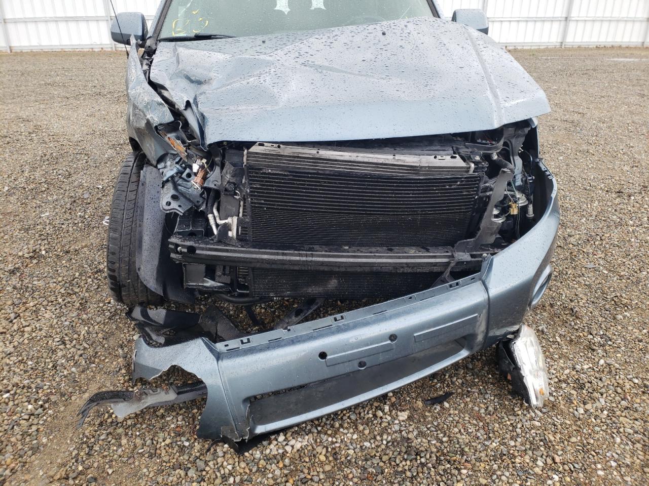 Photo 9 from auction – 2011 FORD ESCAPE LIM with VIN 1FMCU0EG6BKB98464