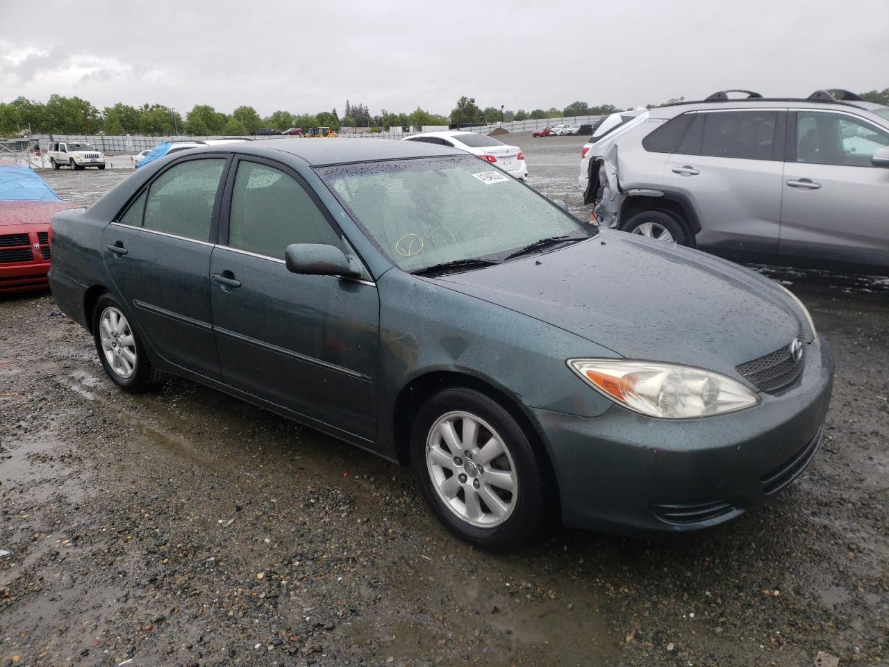 TOYOTA CAMRY LE 2002 with VIN 4T1BE30K12U578872 - Photo from auction