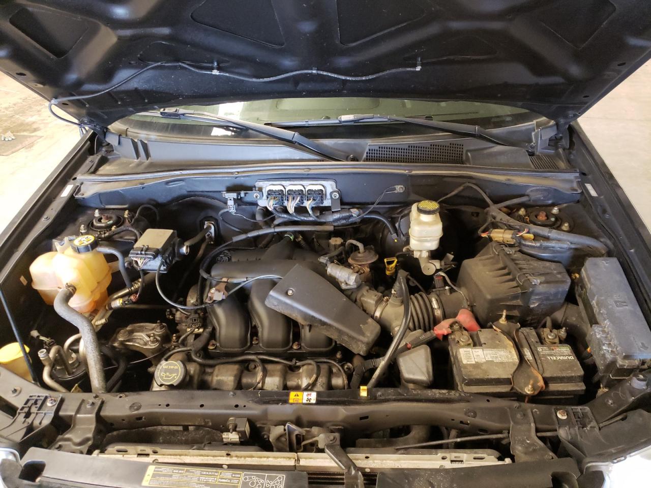 Photo 7 from auction – 2008 FORD ESCAPE LIM with VIN 1FMCU94128KB33055
