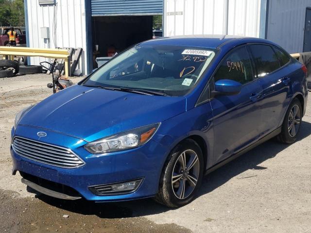 Photo 2 from auction – 2018 FORD FOCUS SE with VIN 1FADP3FE3JL312952