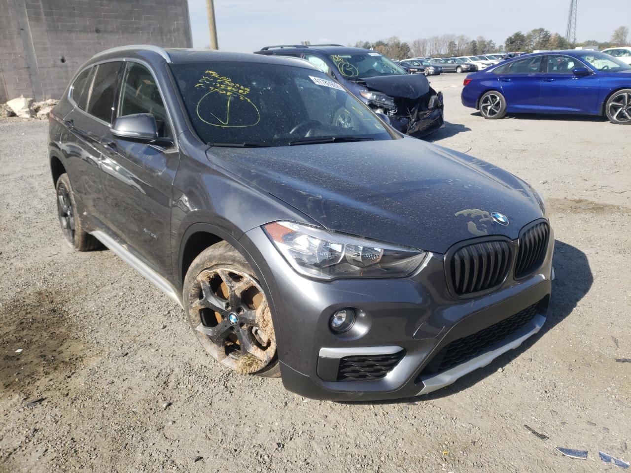 BMW X1 XDRIVE2 2018 with VIN WBXHT3C36J5F90720 - Photo from auction