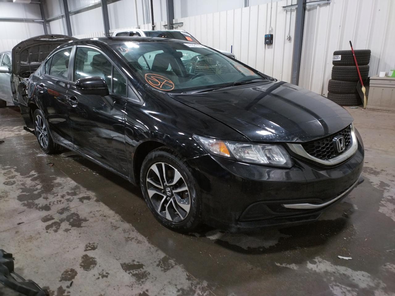 HONDA CIVIC LX 2015 with VIN 2HGFB2F5XFH525043 - Photo from auction