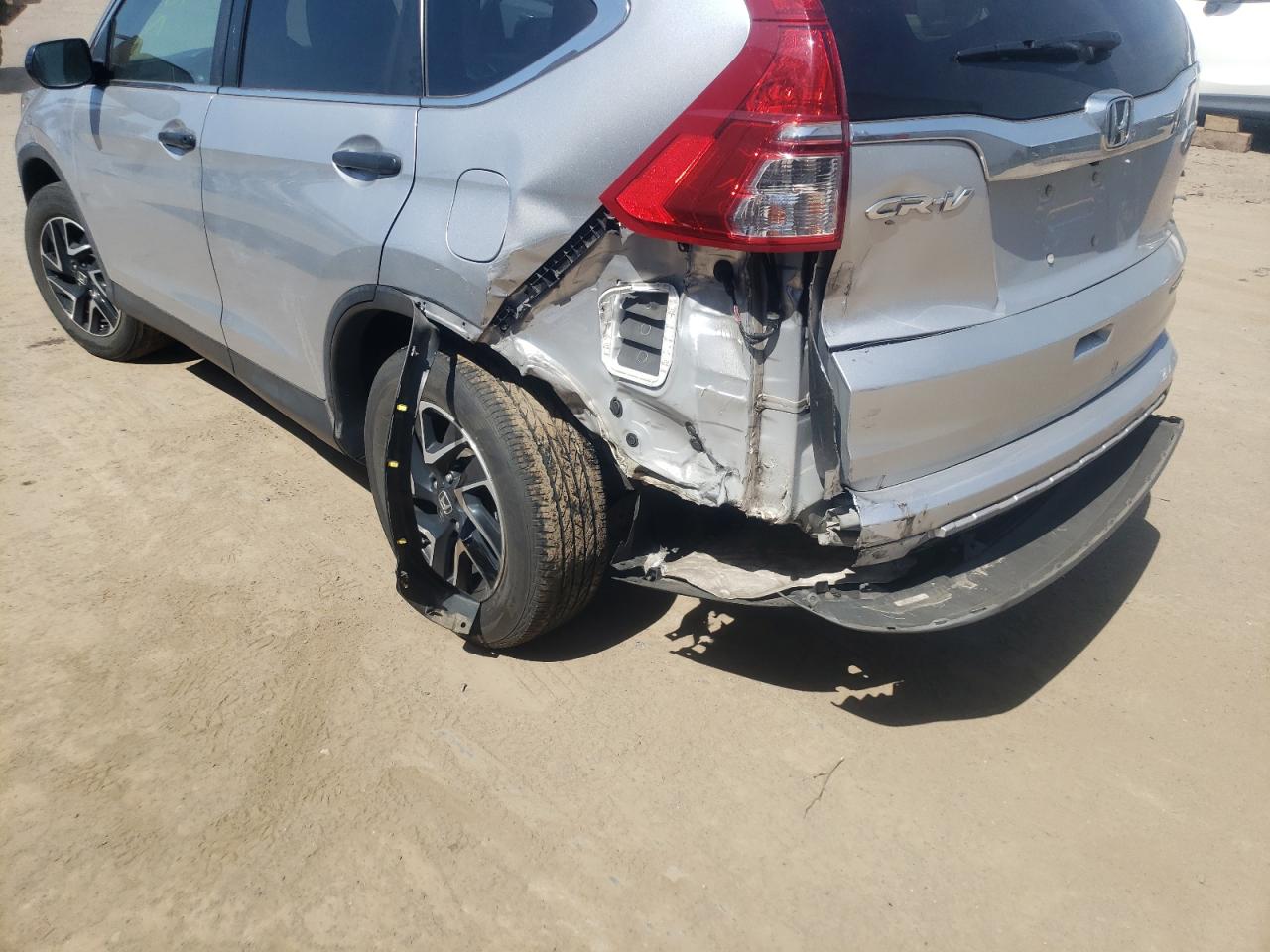 Photo 9 from auction – 2016 HONDA CR-V SE with VIN 2HKRM4H47GH708396