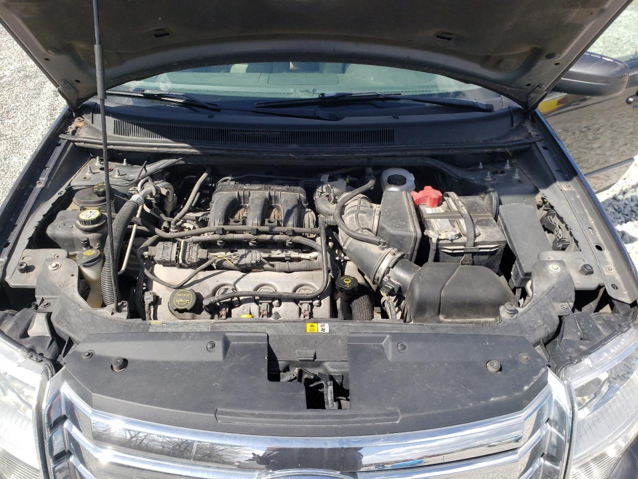 Photo 7 from auction – 2008 FORD TAURUS X S with VIN 1FMDK05W18GA29692