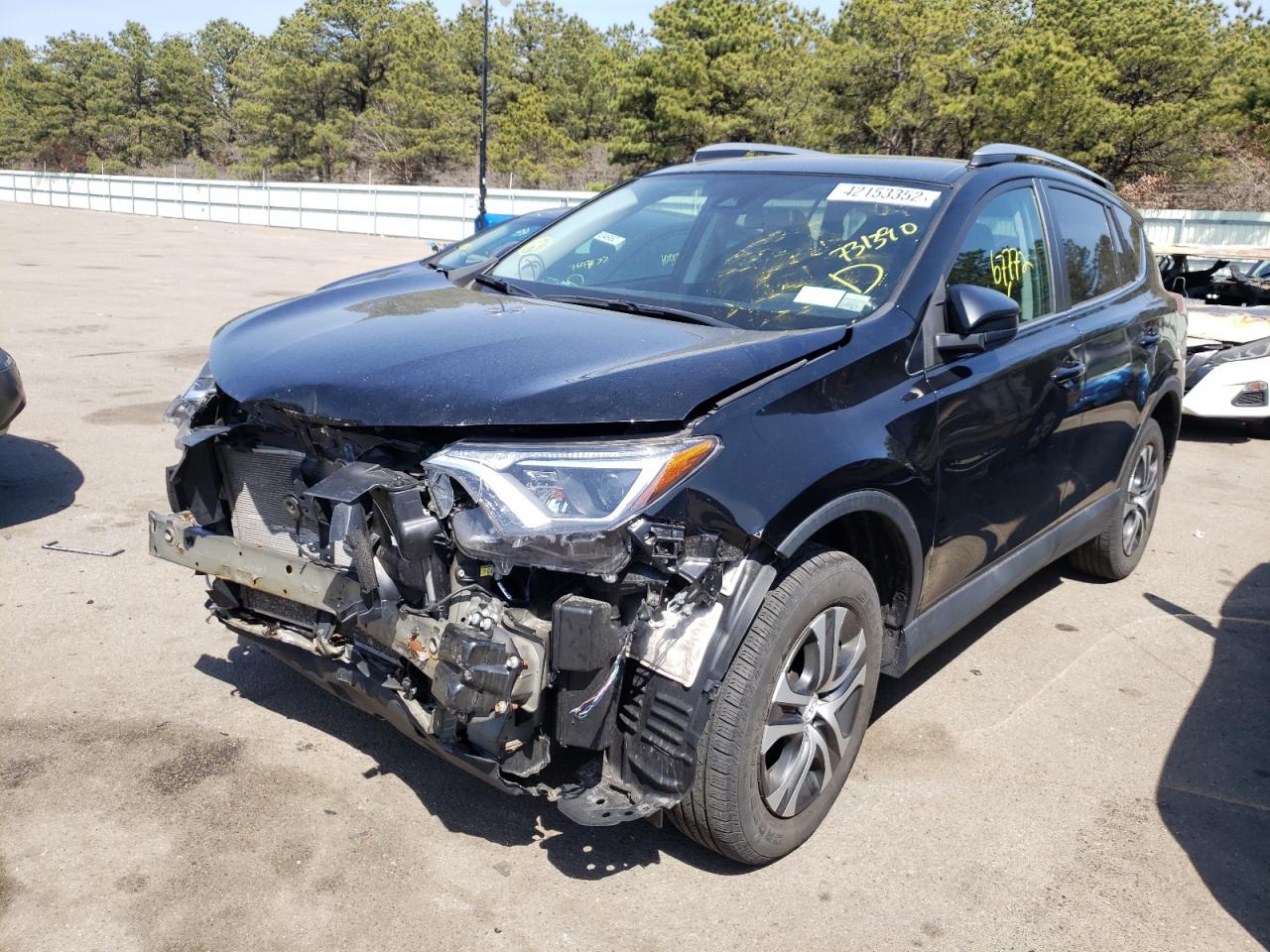 Photo 2 from auction – 2018 TOYOTA RAV4 LE with VIN 2T3BFREV3JW731390