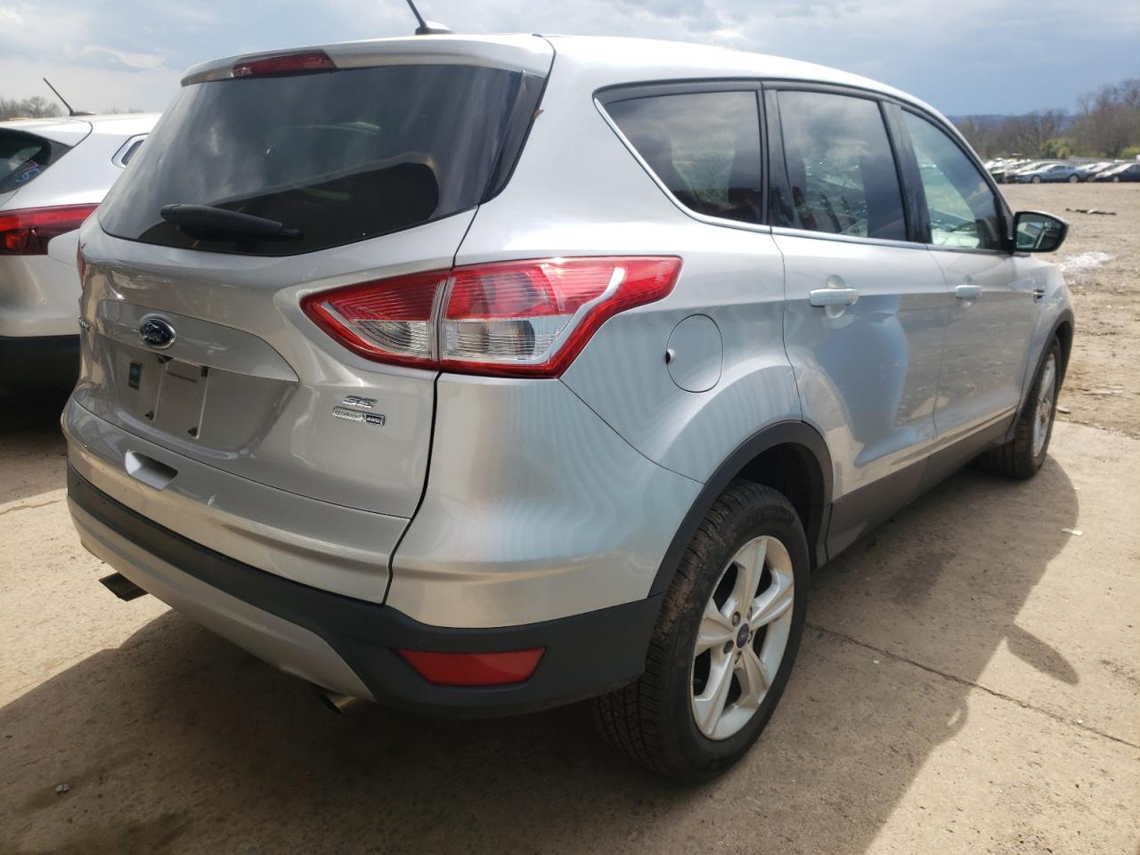 Photo 4 from auction – 2016 FORD ESCAPE SE with VIN 1FMCU9GX4GUA41741