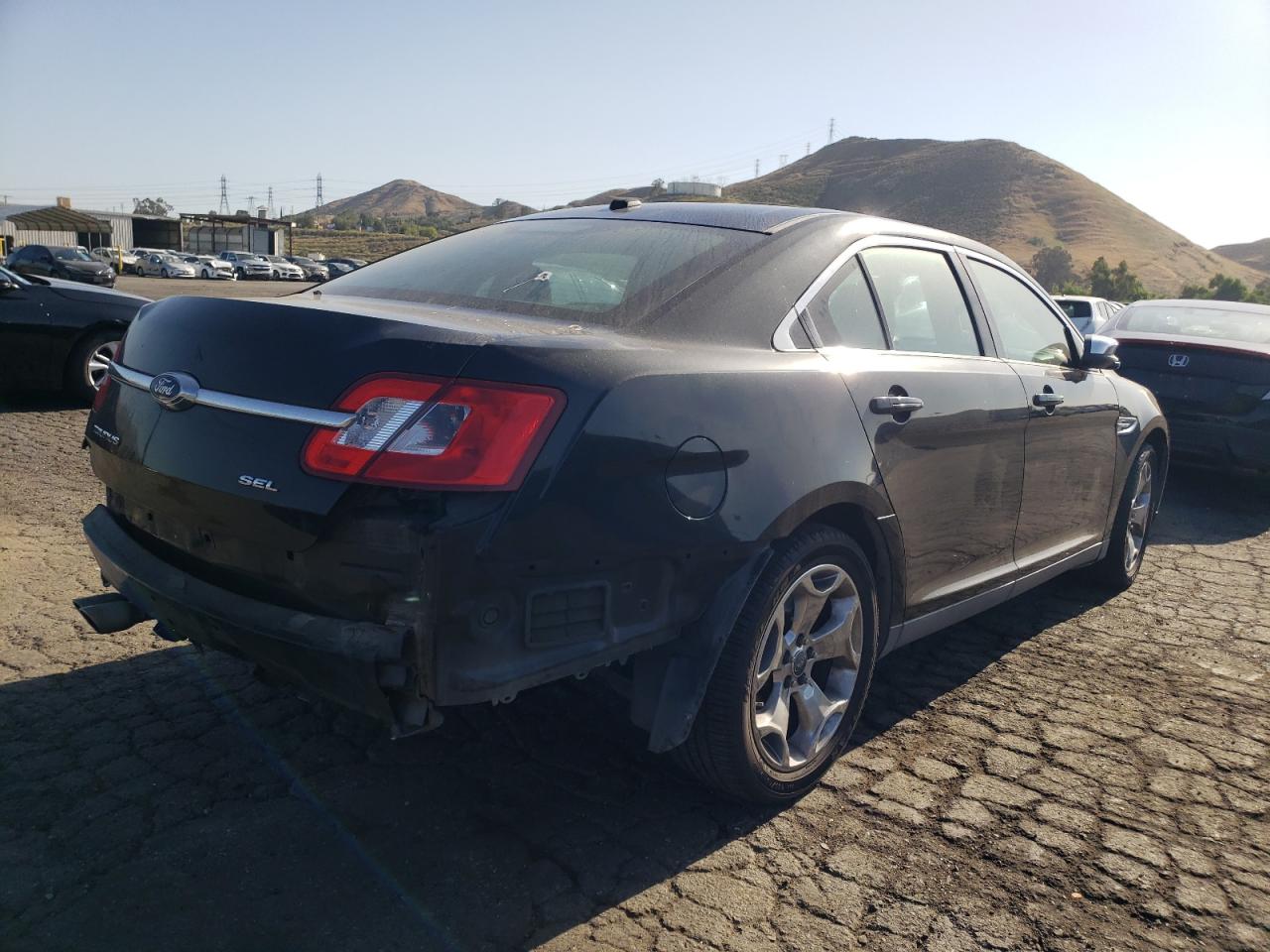 Photo 4 from auction – 2011 FORD TAURUS SEL with VIN 1FAHP2EW3BG177715