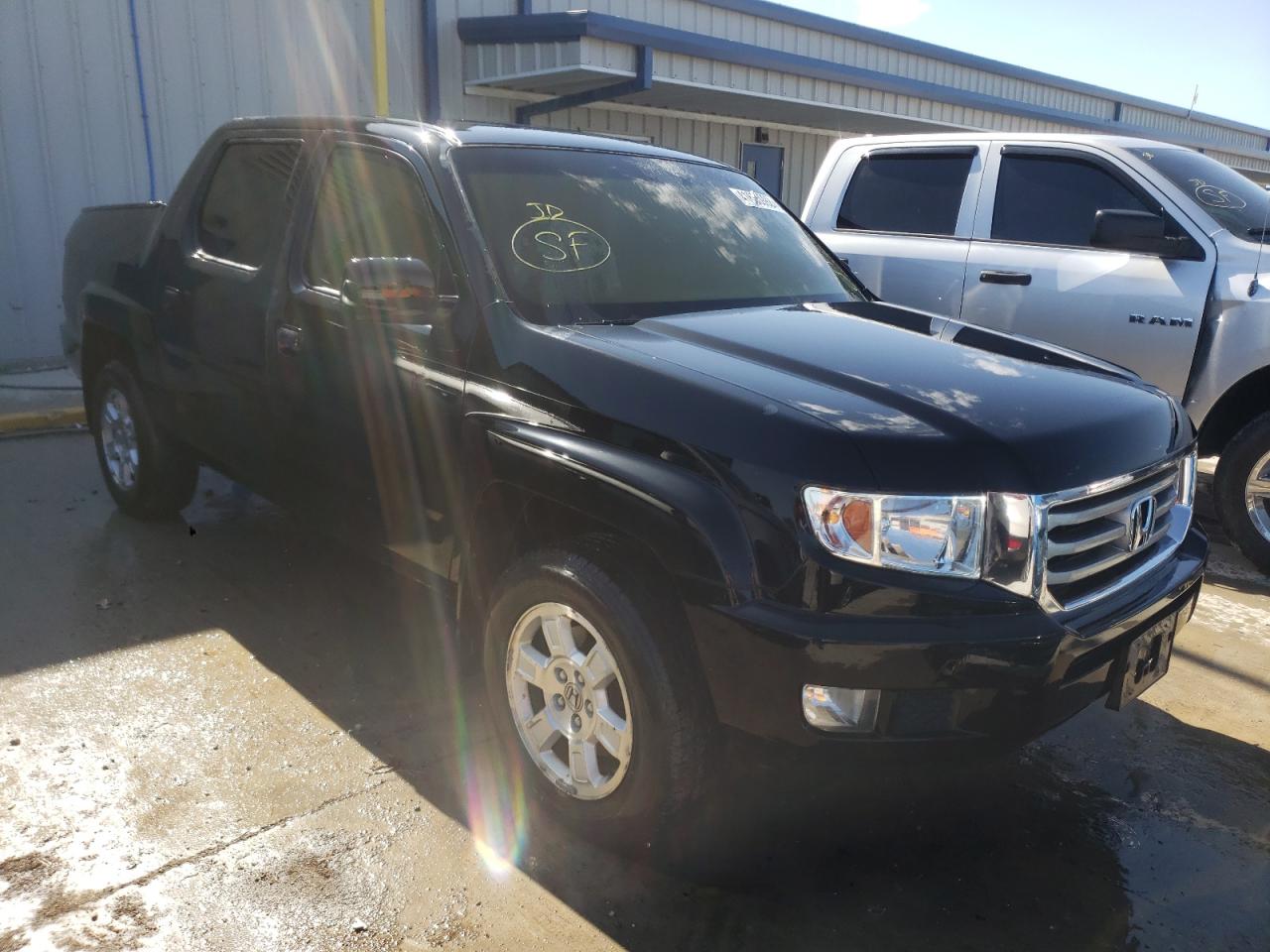 HONDA RIDGELINE 2012 with VIN 5FPYK1F42CB457855 - Photo from auction