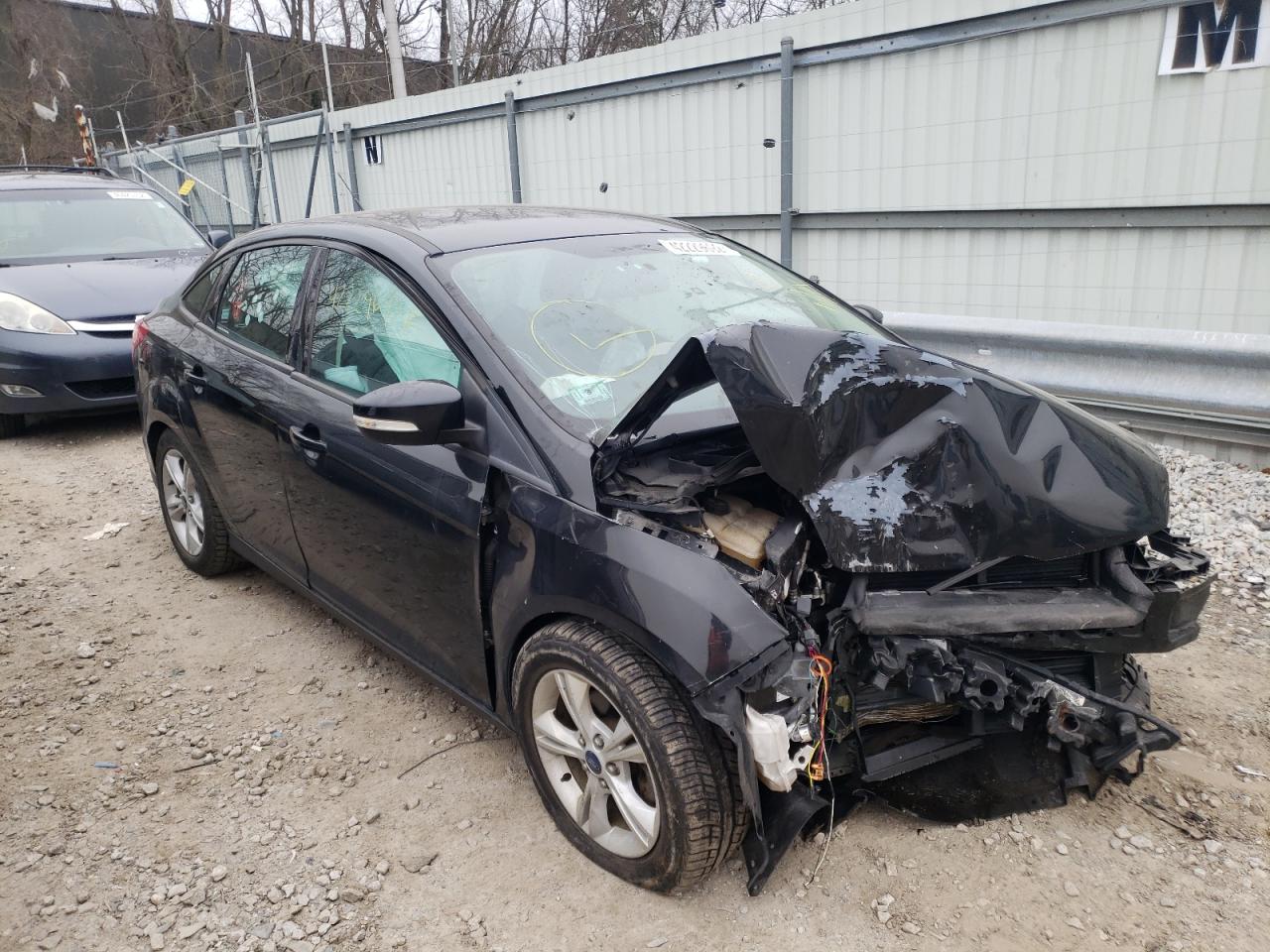 FORD FOCUS SE 2014 with VIN 1FADP3F25EL401692 - Photo from auction