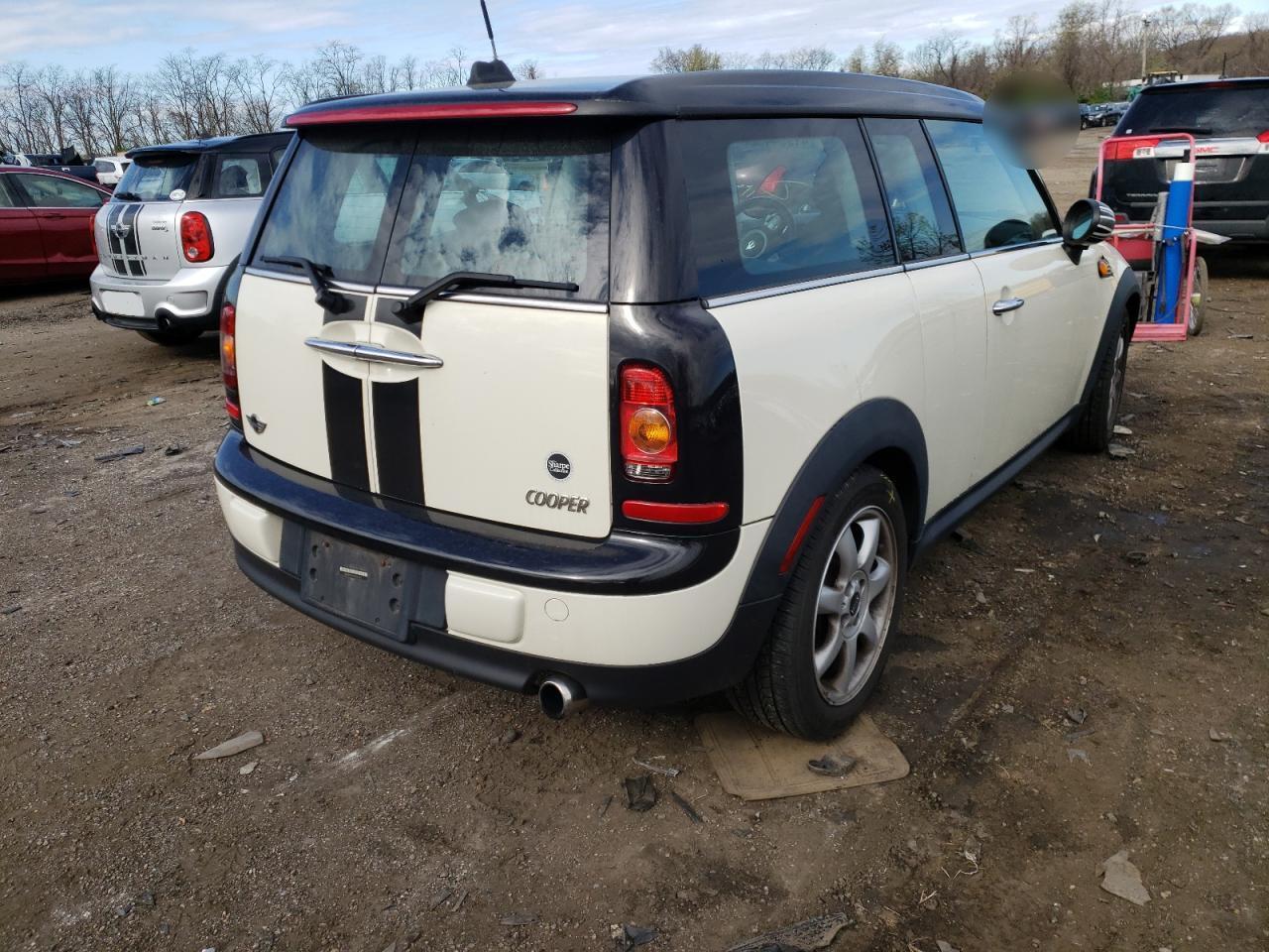 Photo 4 from auction – 2009 MINI COOPER CLU with VIN WMWML335X9TX34817
