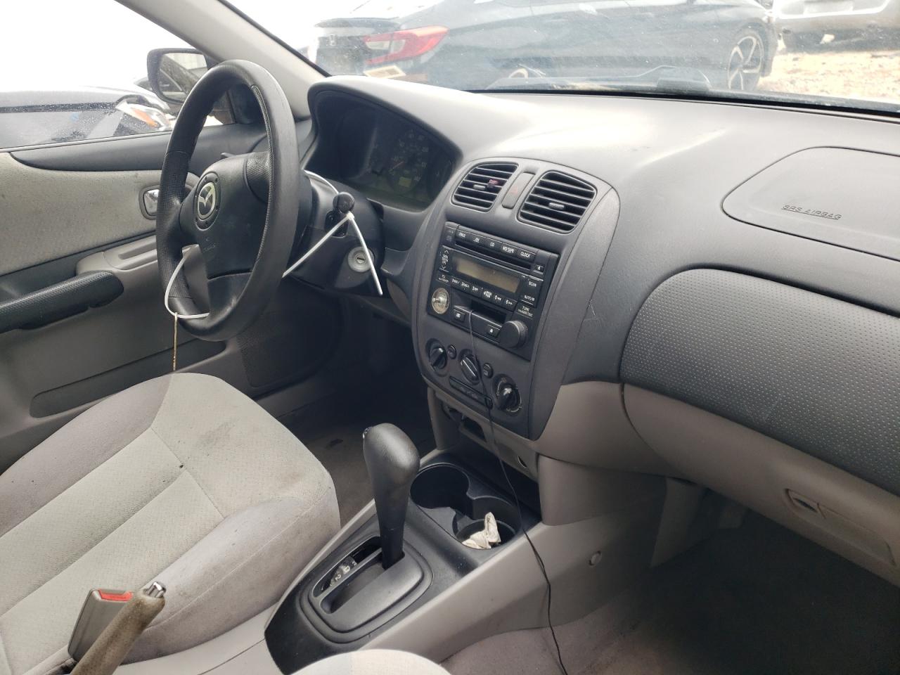 Photo 9 from auction – 2003 MAZDA PROTEGE DX with VIN JM1BJ225330146102