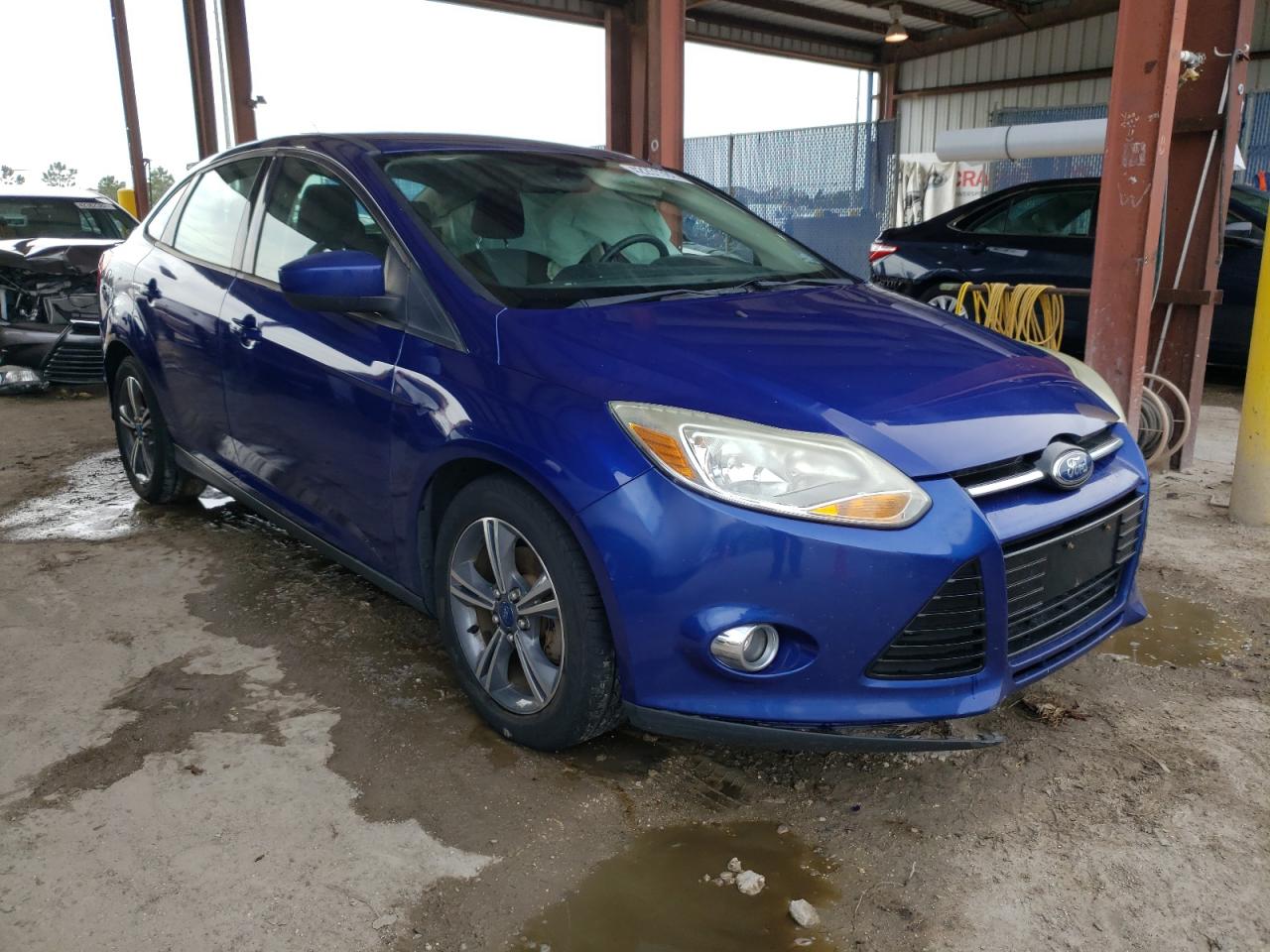 FORD FOCUS SE 2012 with VIN 1FAHP3F2XCL306933 - Photo from auction