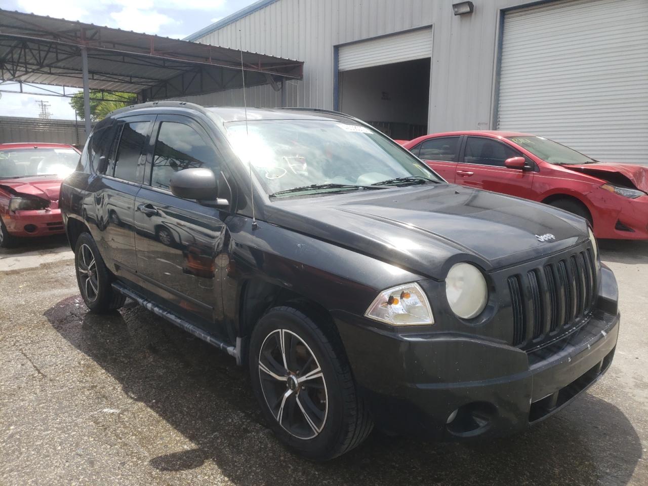 JEEP COMPASS SP 2010 with VIN 1J4NT4FB5AD601969 - Photo from auction