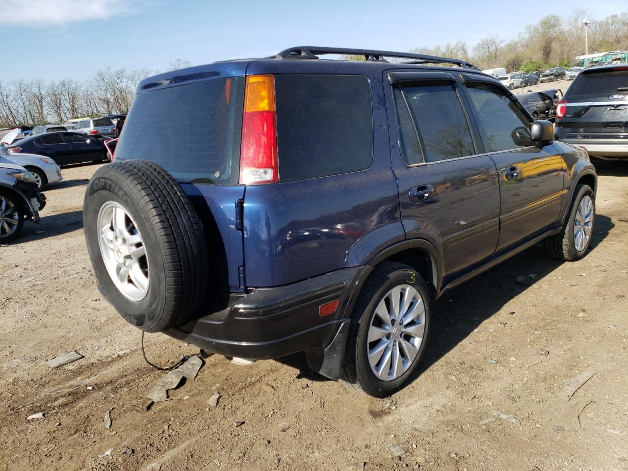 Photo 4 from auction – 1999 HONDA CR-V with VIN JHLRD1842XC063699