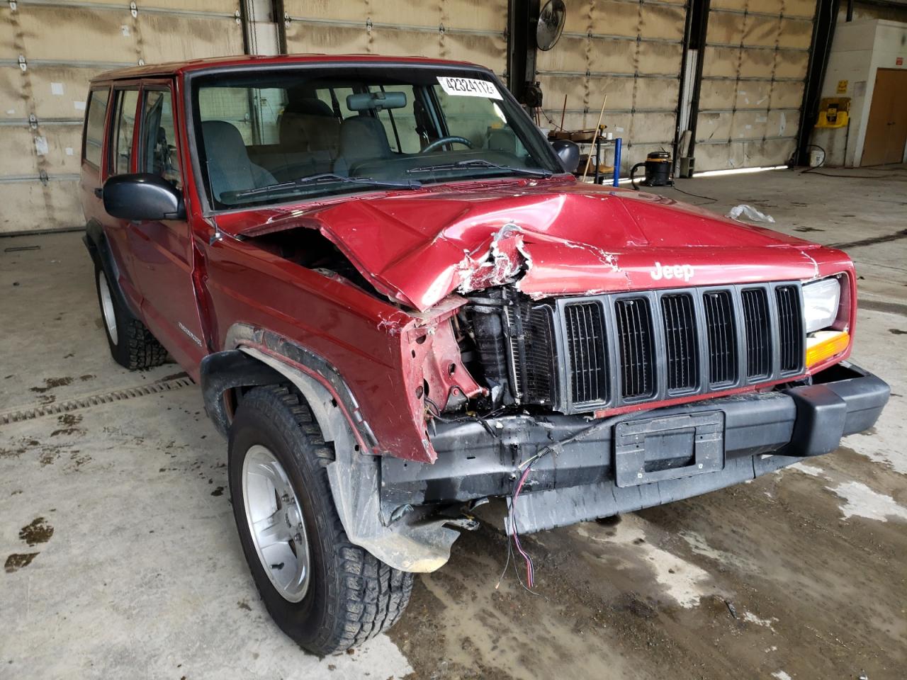 JEEP CHEROKEE S 1999 with VIN 1J4FF28S5XL570279 - Photo from auction