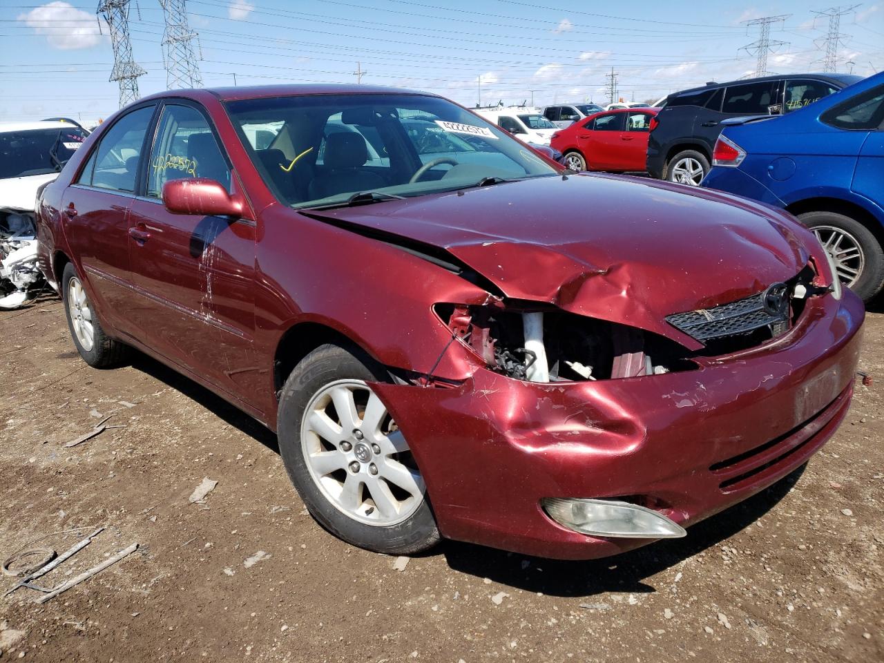 TOYOTA CAMRY LE 2003 with VIN 4T1BF30K43U046403 - Photo from auction