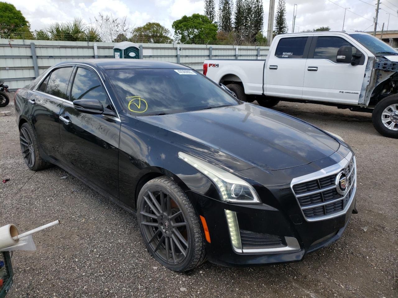 CADILLAC CTS 2014 with VIN 1G6AP5SX6E0147991 - Photo from auction