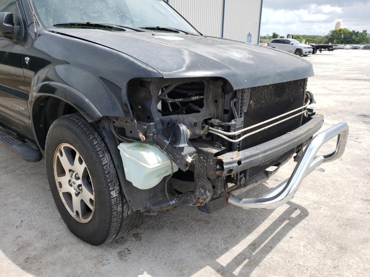 Photo 9 from auction – 2002 FORD ESCAPE XLT with VIN 1FMCU03142KE08882