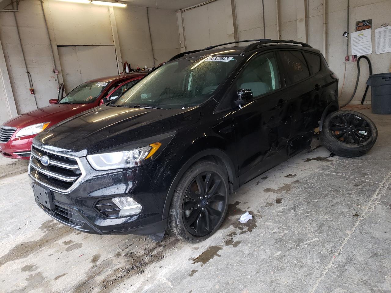 Photo 2 from auction – 2017 FORD ESCAPE TIT with VIN 1FMCU9JD2HUD03241