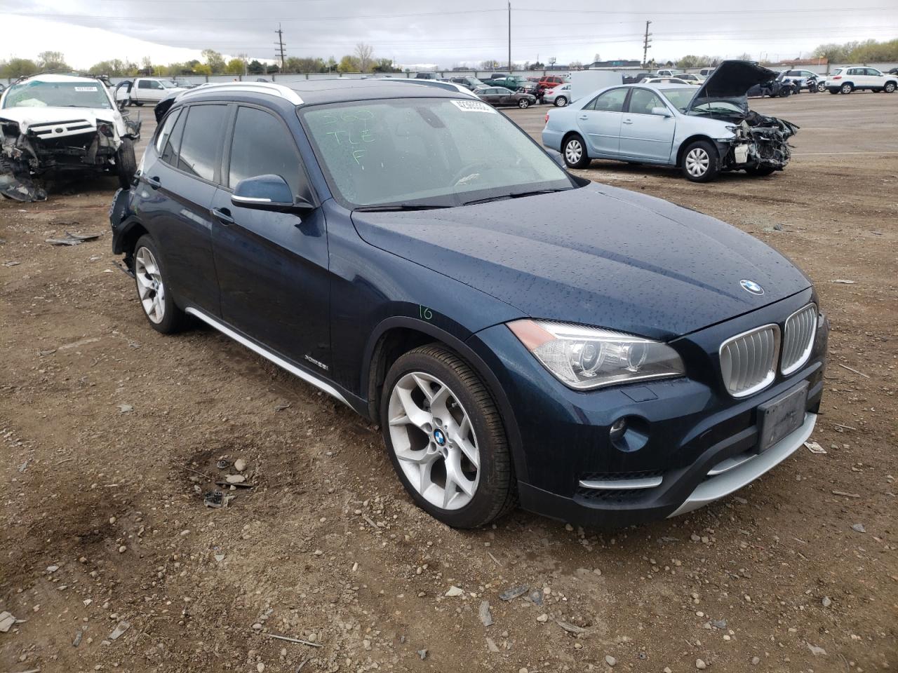 BMW X1 XDRIVE2 2014 with VIN WBAVL1C53EVY14760 - Photo from auction