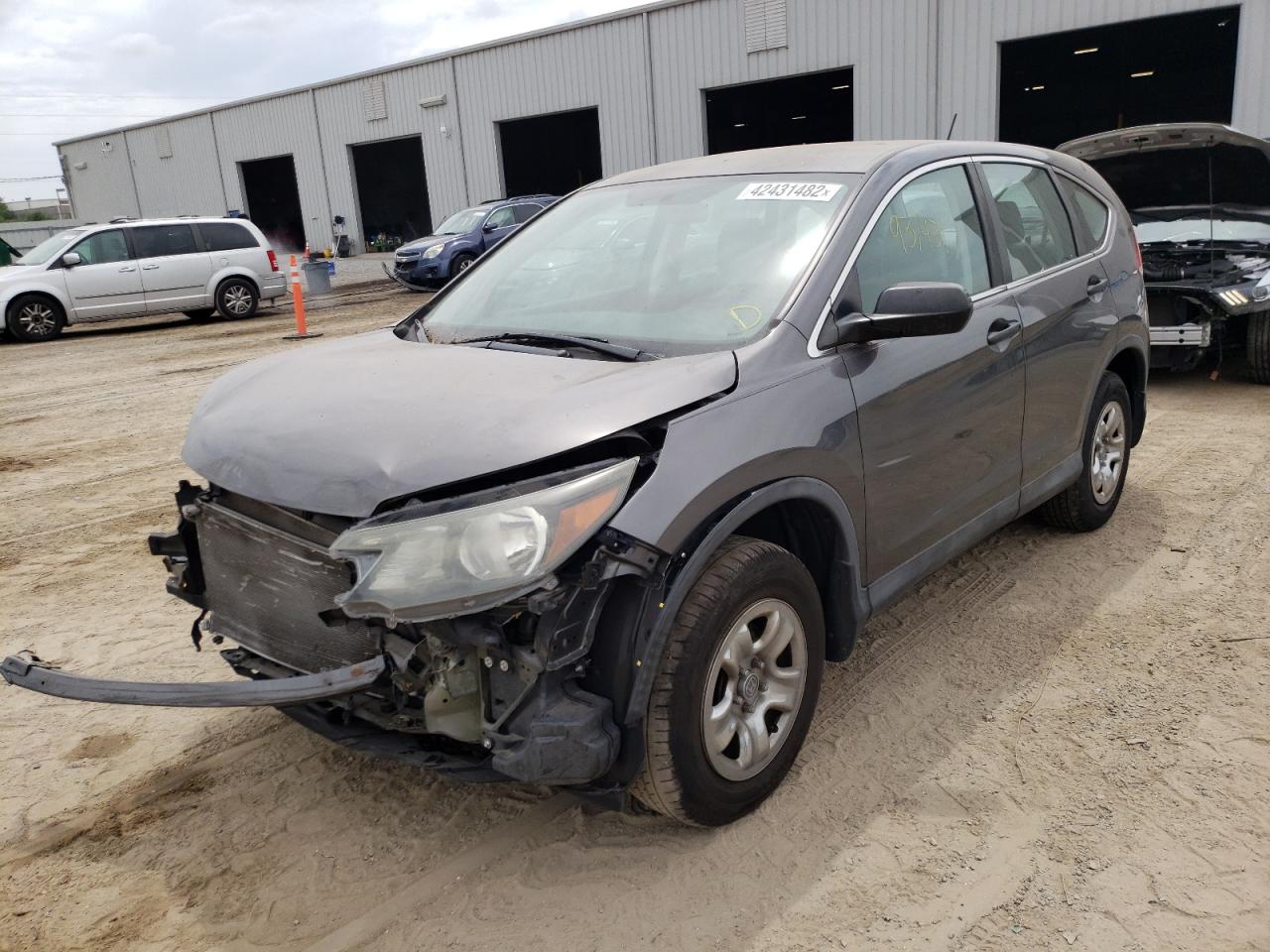 Photo 2 from auction – 2014 HONDA CR-V LX with VIN 2HKRM4H33EH614634