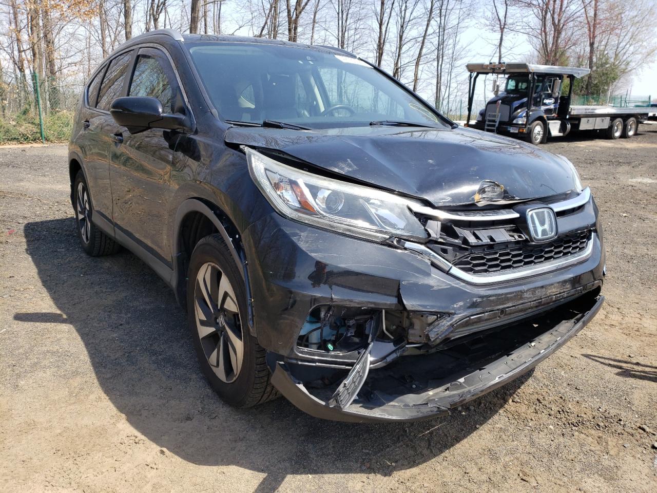 HONDA CR-V TOURI 2016 with VIN 5J6RM4H99GL076762 - Photo from auction