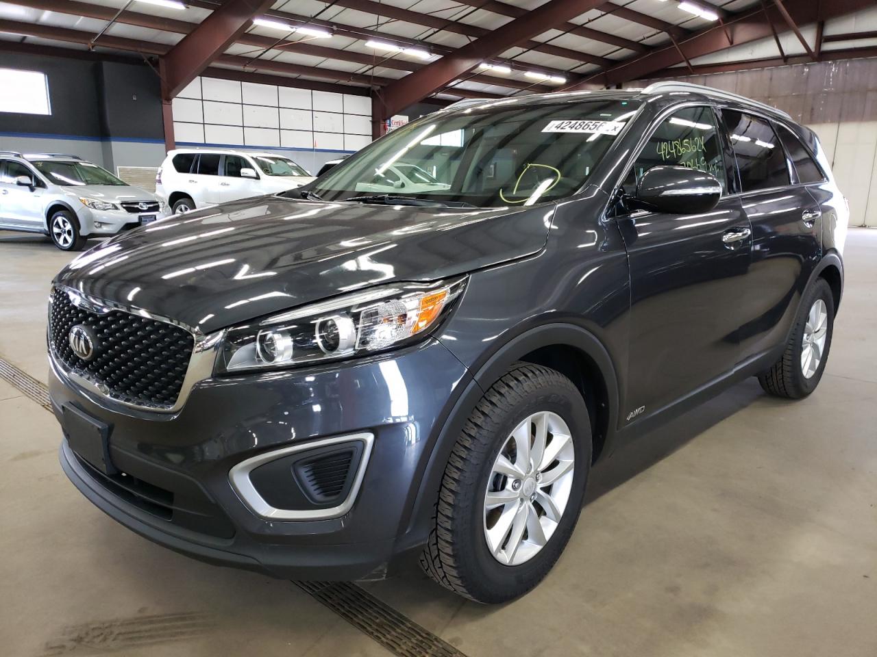 Photo 2 from auction – 2016 KIA SORENTO LX with VIN 5XYPGDA36GG169308