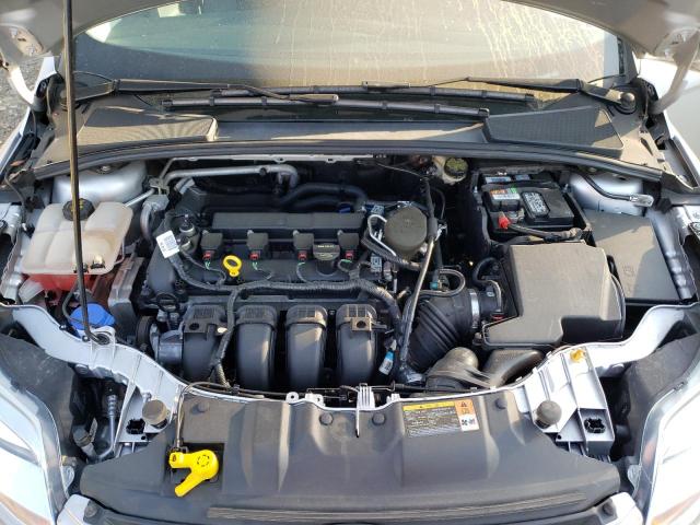 Photo 7 from auction – 2014 FORD FOCUS S with VIN 1FADP3E24EL208077