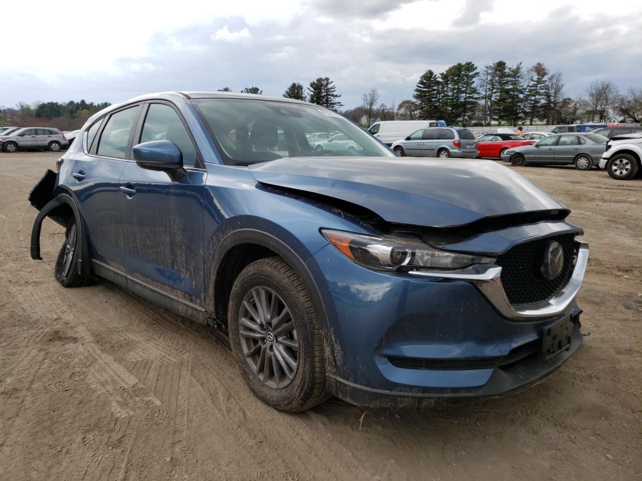 MAZDA CX-5 SPORT 2019 with VIN JM3KFBBM1K0595874 - Photo from auction