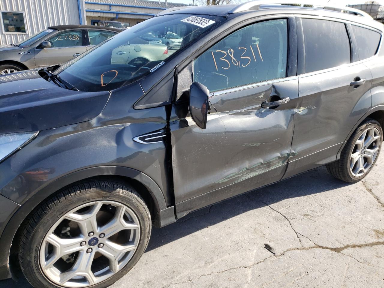 Photo 9 from auction – 2017 FORD ESCAPE TIT with VIN 1FMCU0J9XHUA93575