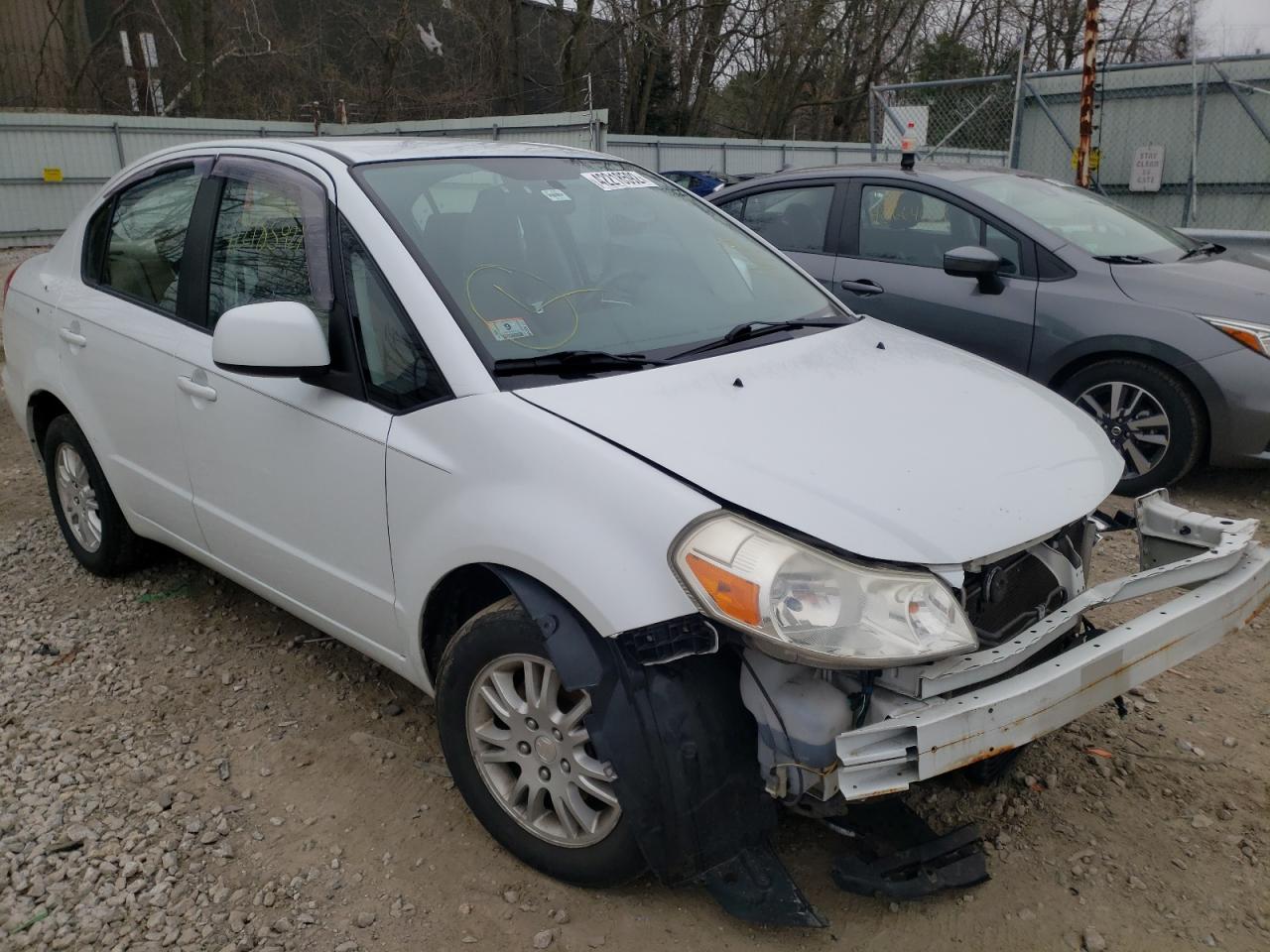 SUZUKI SX4 LE 2012 with VIN JS2YC5A36C6300889 - Photo from auction