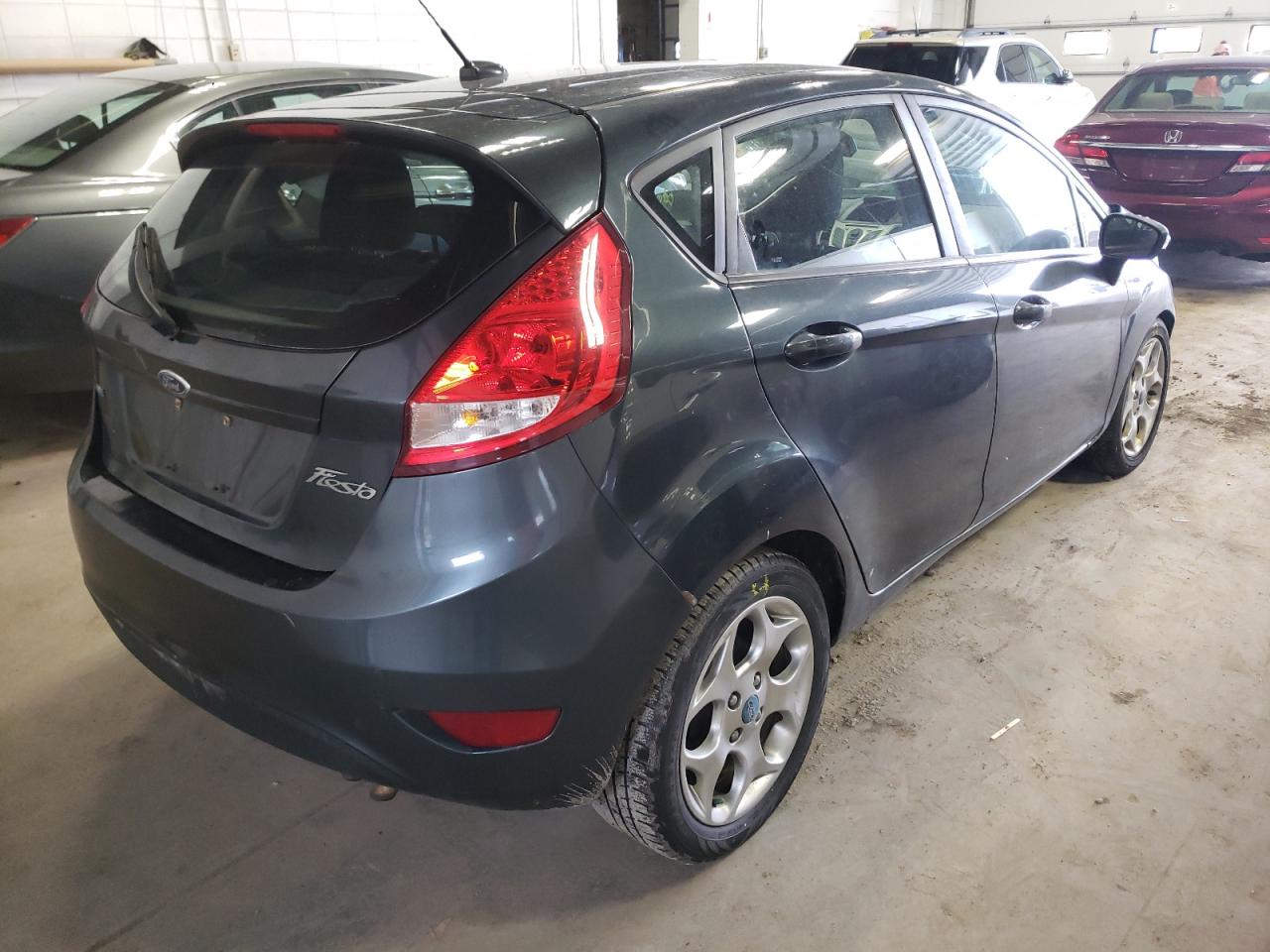 Photo 4 from auction – 2011 FORD FIESTA SES with VIN 3FADP4FJ1BM233847