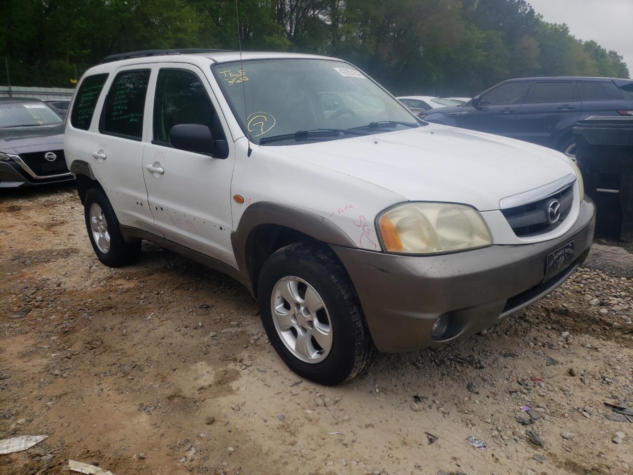 MAZDA TRIBUTE LX 2004 with VIN 4F2CZ04104KM17859 - Photo from auction