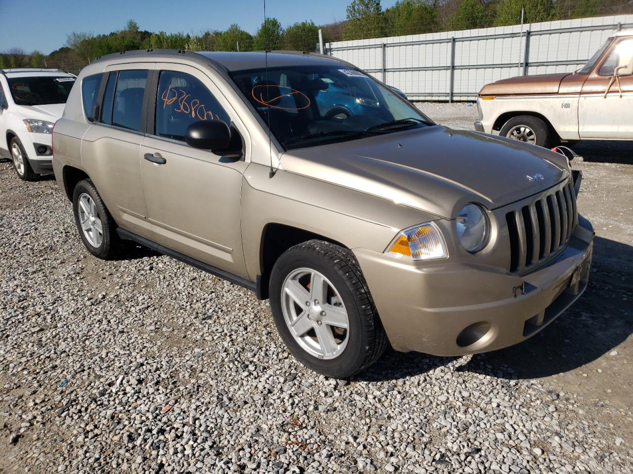 JEEP COMPASS SP 2010 with VIN 1J4NT4FA2AD515090 - Photo from auction